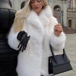 Manteau en fausse fourrure à revers crantés blanc Veste d'hiver écologique pour femme 2026